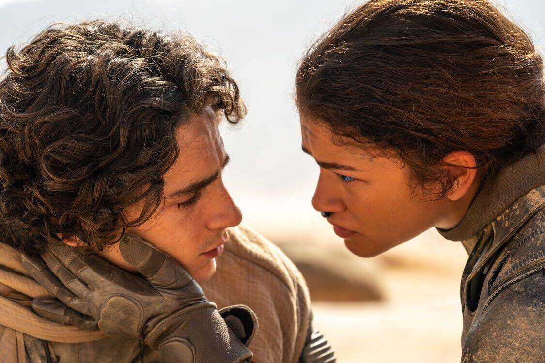 Dune: Part Two movie poster featuring Timothée Chalamet and Zendaya against a desert backdrop.