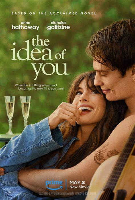 Alt text: Anne Hathaway and Nicholas Galitzine in a romantic embrace in "The Idea of You" trailer.