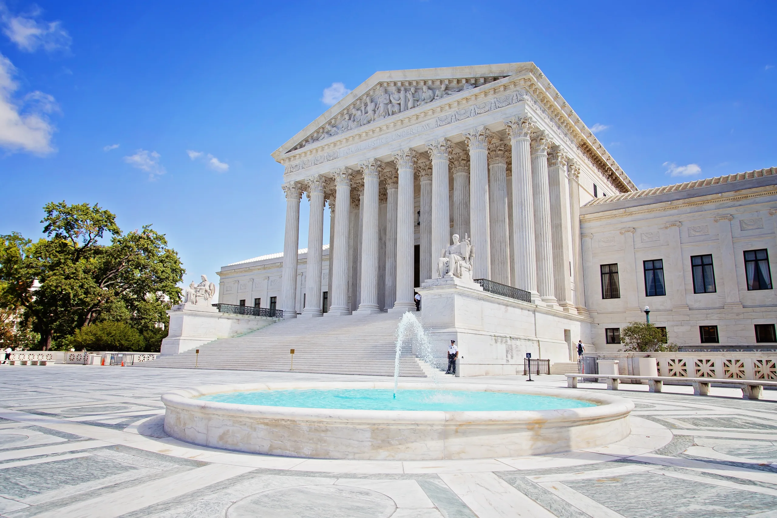 Image of the Supreme Court building with text "Supreme Court Upholds Trump's Right to Run in 2024