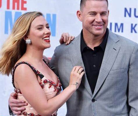 Scarlett Johansson and Channing Tatum at the Fly Me to the Moon premiere in Berlin, smiling and posing together."